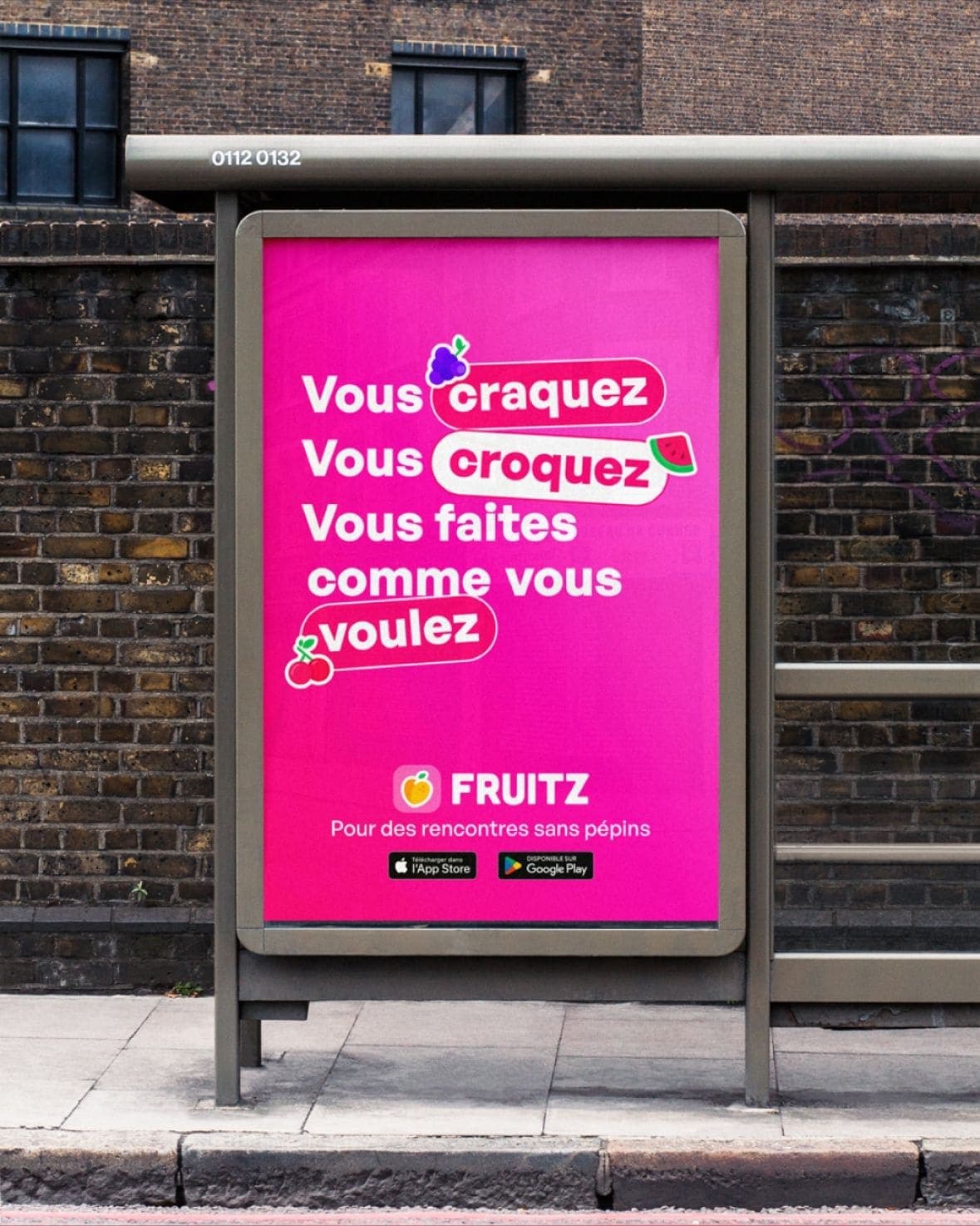 A bus shelter poster reading Vous craquez, vous croquez, vous faites comme vous voulez, above the line Pour des rencontres sans pepins
